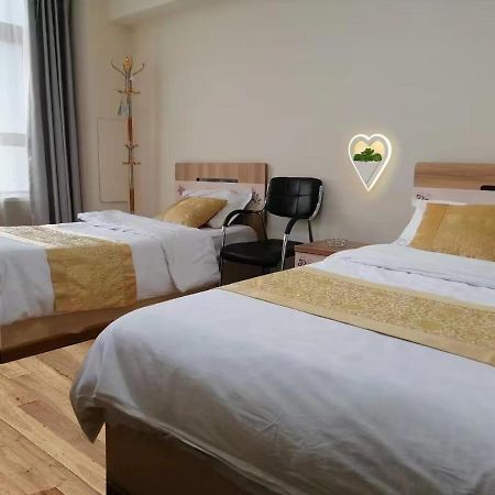 Xinming Fashion Hotel Yanji Buitenkant foto