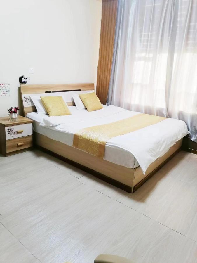 Xinming Fashion Hotel Yanji Buitenkant foto